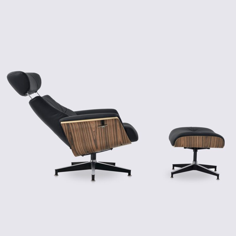 sillón y otomana eames en piel plena flor negra y palisandro con cómodo mecanismo reclinable ajustable