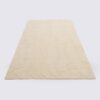 tapis moderne beige motif vagues fait main grand format 300cm pour salon