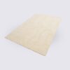 tapis moderne beige motif vagues fait main grand format 200cm pour salon